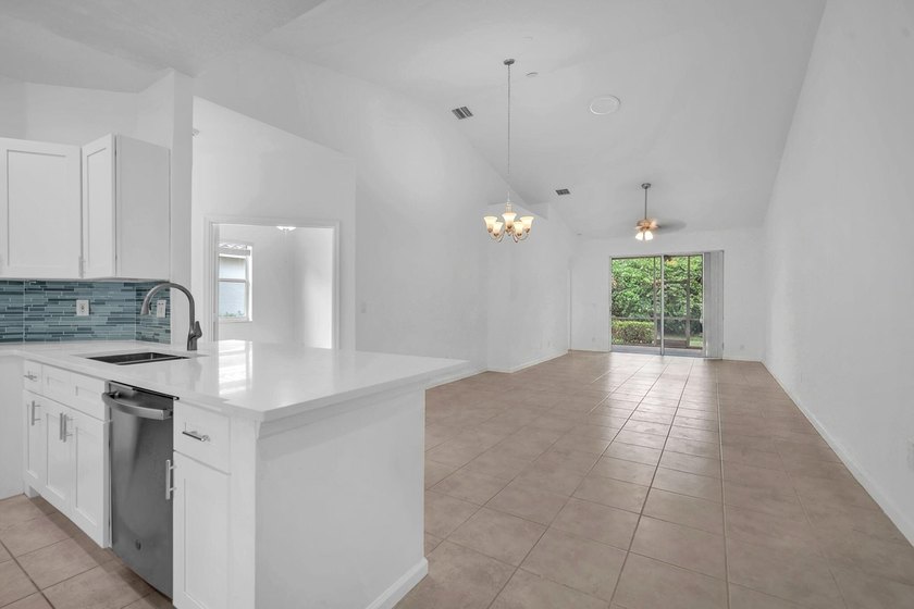 Welcome home to this beautifully updated villa in the highly - photo 8