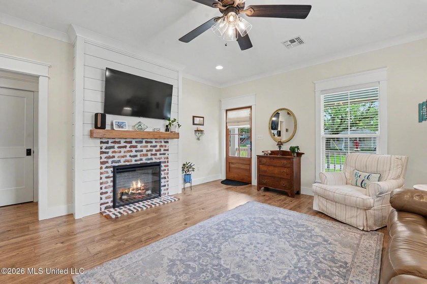 Nestled amongst majestic Live Oaks on one of Waveland's most - photo 5