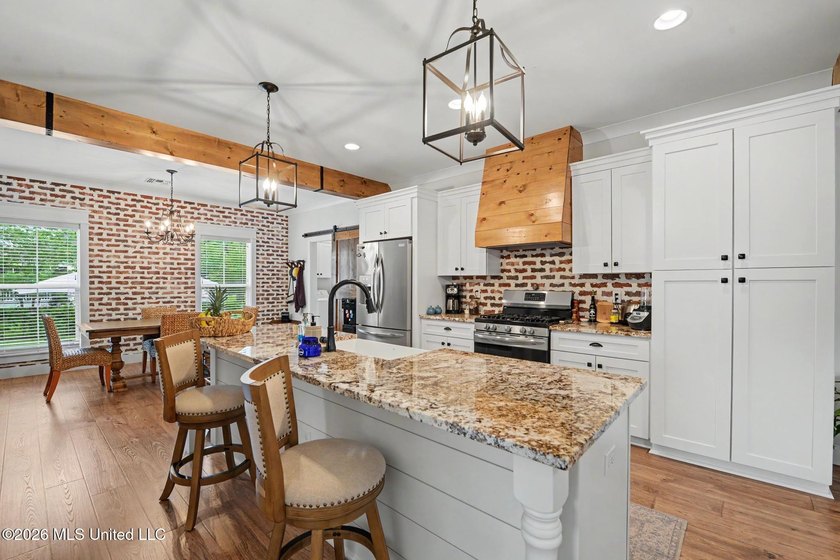 Nestled amongst majestic Live Oaks on one of Waveland's most - photo 8