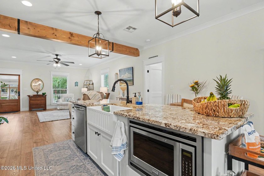 Nestled amongst majestic Live Oaks on one of Waveland's most - photo 9