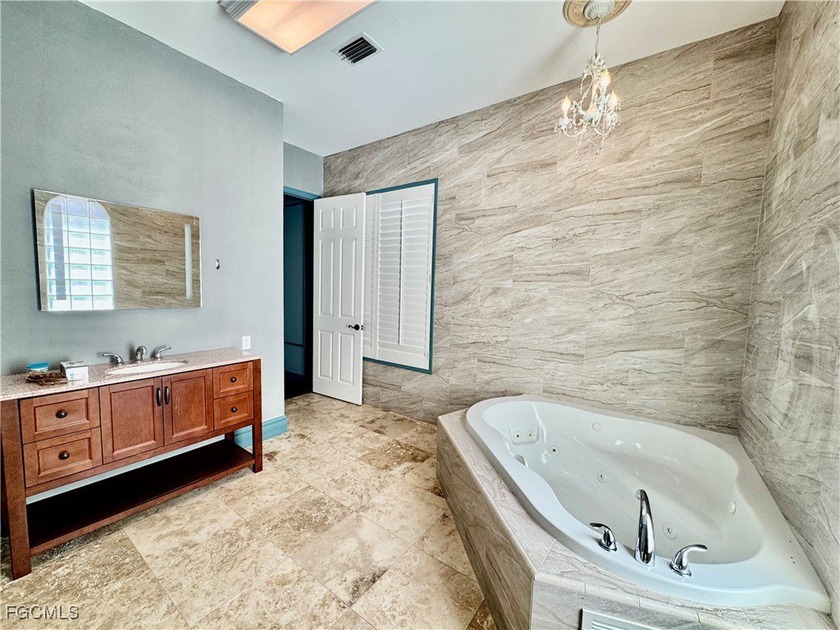 Enjoy nearly 150 ft of direct Gulf Access waterfront! A - photo 32