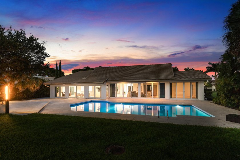 Located in the prestigious Seagate Country Club, this - photo 3