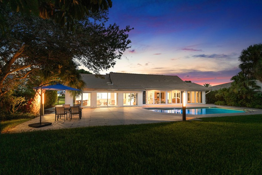 Located in the prestigious Seagate Country Club, this - photo 4