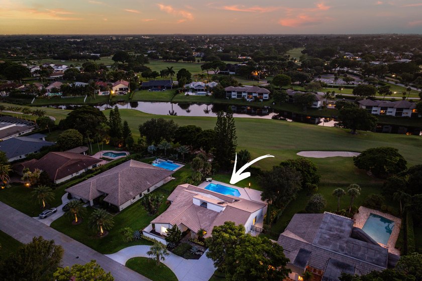 Located in the prestigious Seagate Country Club, this - photo 5