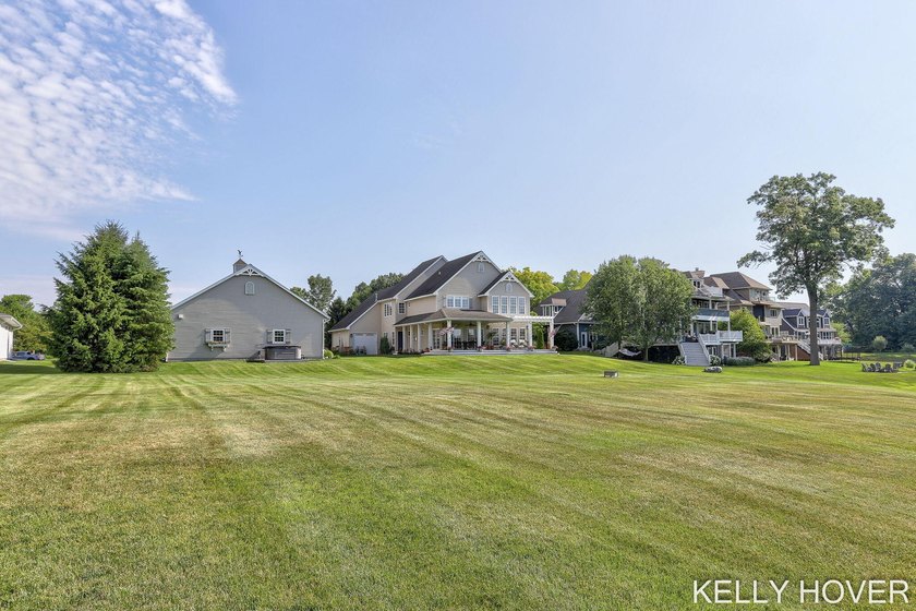 Experience the **Gun Lake lifestyle** in this beautifully - photo 42
