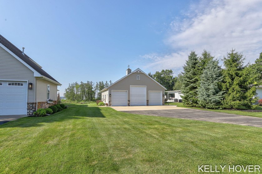 Experience the **Gun Lake lifestyle** in this beautifully - photo 47