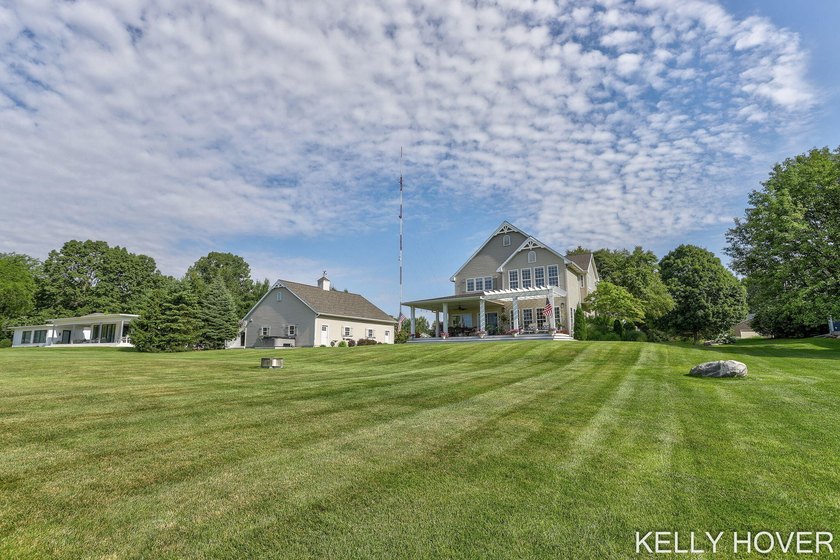 Experience the **Gun Lake lifestyle** in this beautifully - photo 48