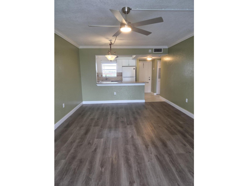PRICE, LOCATION &amp; STYLE! Beautifully updated 55+ 1/1 condo - photo 9