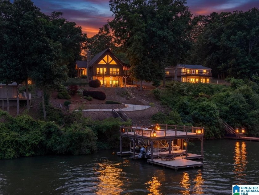 Experience refined lakefront living in this exceptional log - photo 4