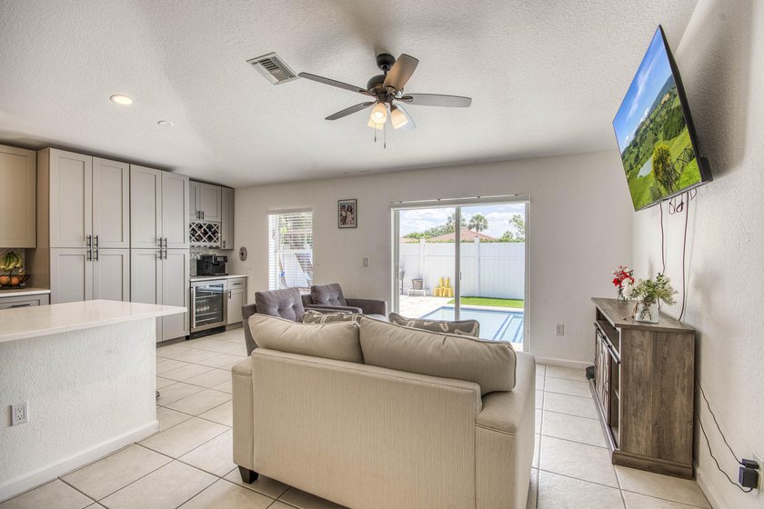 Beautifully updated 4-bedroom, 2-bath home featuring a brand-new - photo 13
