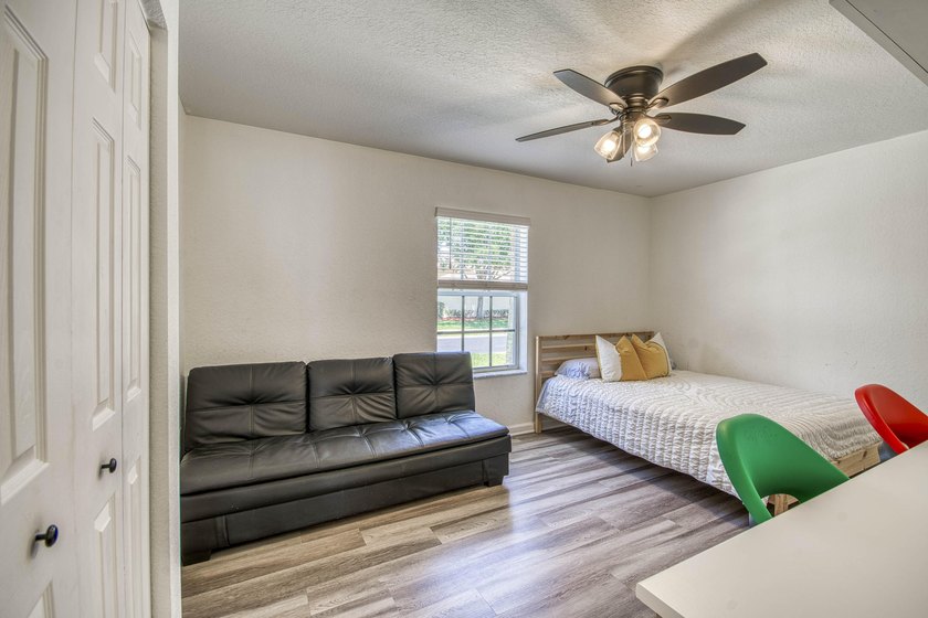Beautifully updated 4-bedroom, 2-bath home featuring a brand-new - photo 21