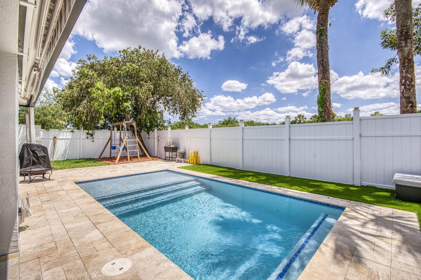 Beautifully updated 4-bedroom, 2-bath home featuring a brand-new - photo 26