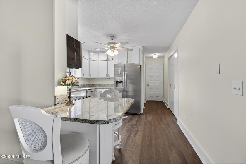 Beautiful all-brick home on the 2nd fairway! This 3-bedroom - photo 35