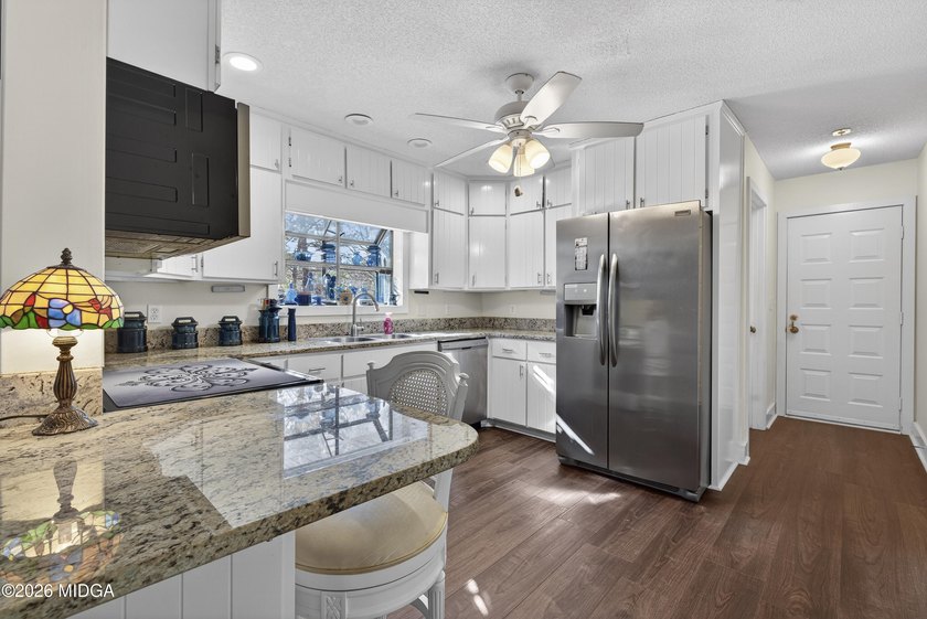 Beautiful all-brick home on the 2nd fairway! This 3-bedroom - photo 36