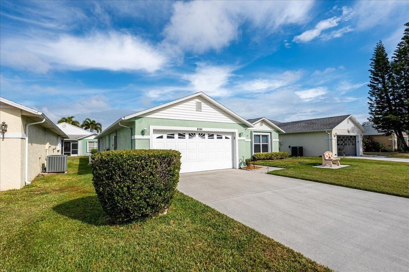Welcome home to this impeccably kept home in a 55+ gated - photo 5