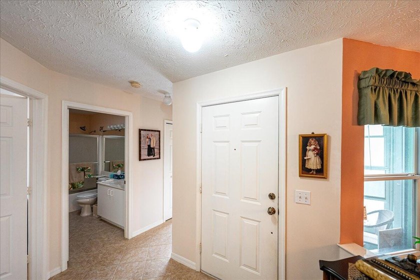 Welcome home to this impeccably kept home in a 55+ gated - photo 7