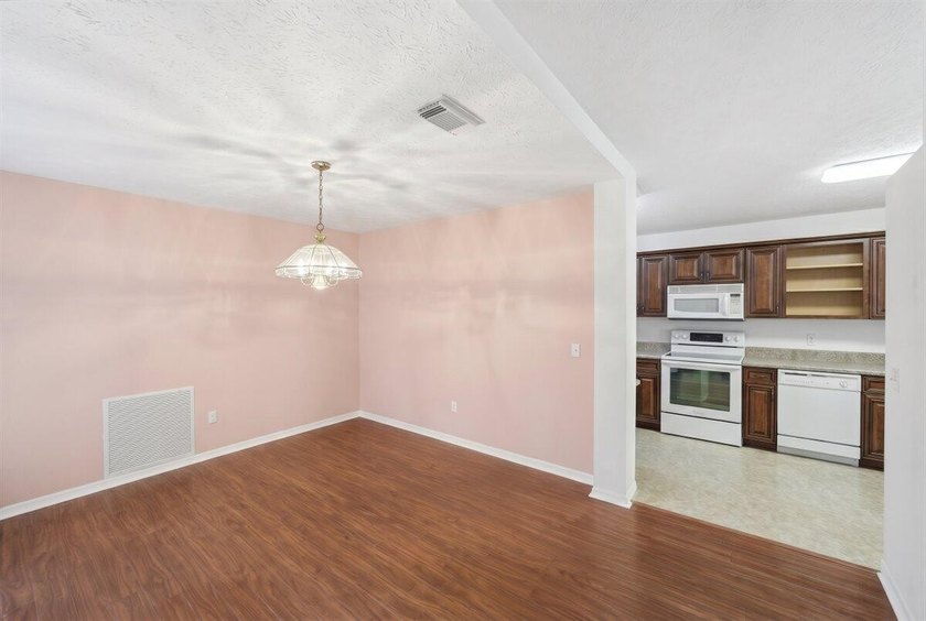 Welcome home to this impeccably kept home in a 55+ gated - photo 10
