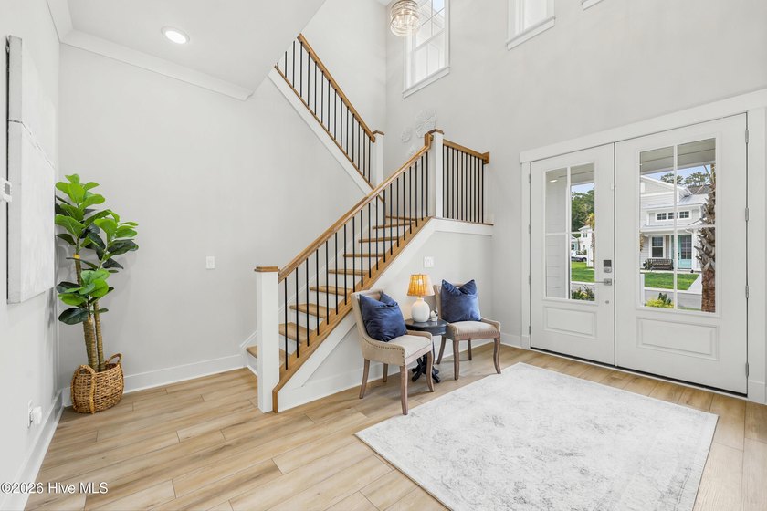 The St. Thomas floor plan offers a two-story design with - photo 2