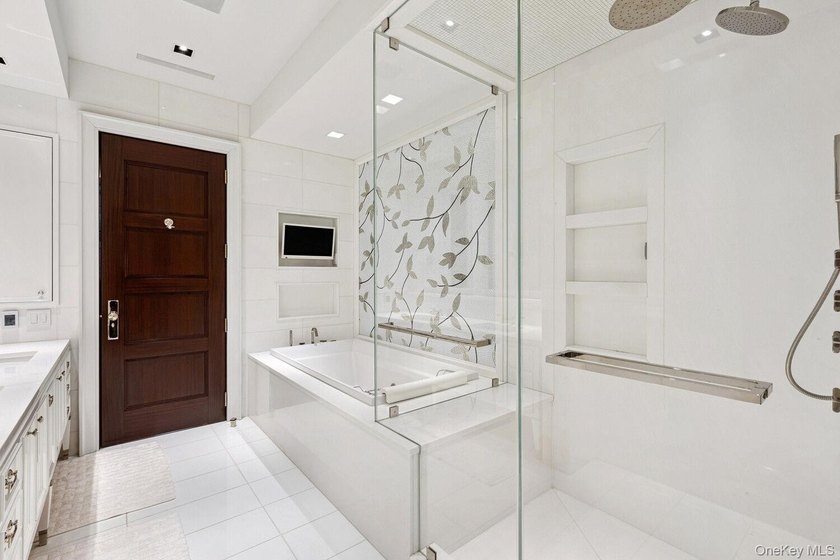 This exceptional over 20-foot-wide townhouse is discreetly - photo 22
