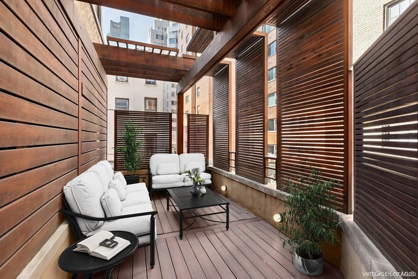 This exceptional over 20-foot-wide townhouse is discreetly - photo 26