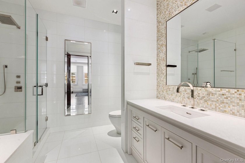 This exceptional over 20-foot-wide townhouse is discreetly - photo 29