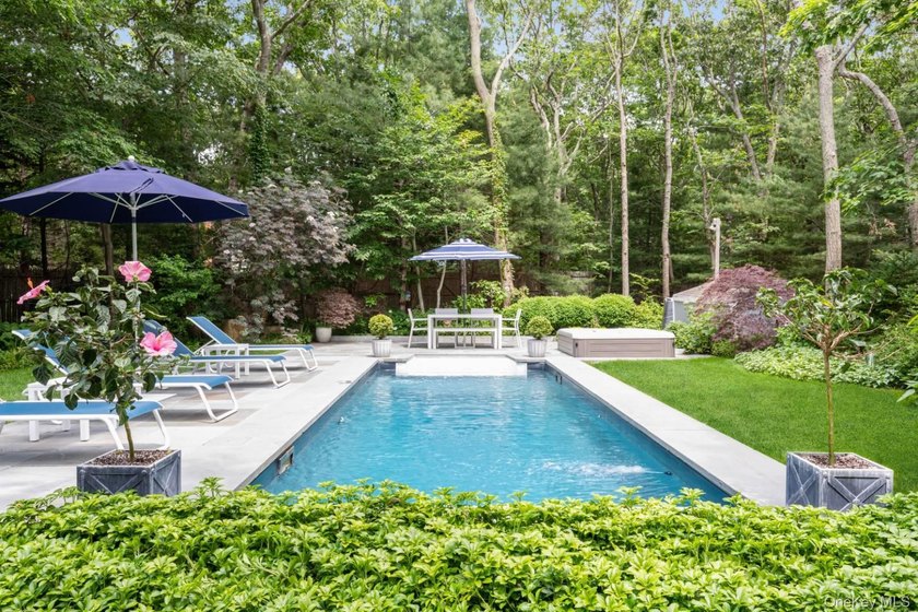 On a private, scenic, .98-acre lot in East Hampton Village - photo 2