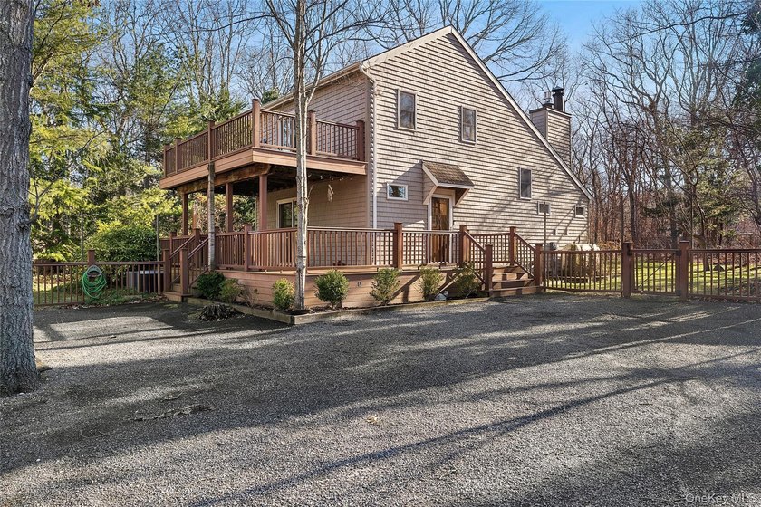 On a private, scenic, .98-acre lot in East Hampton Village - photo 3