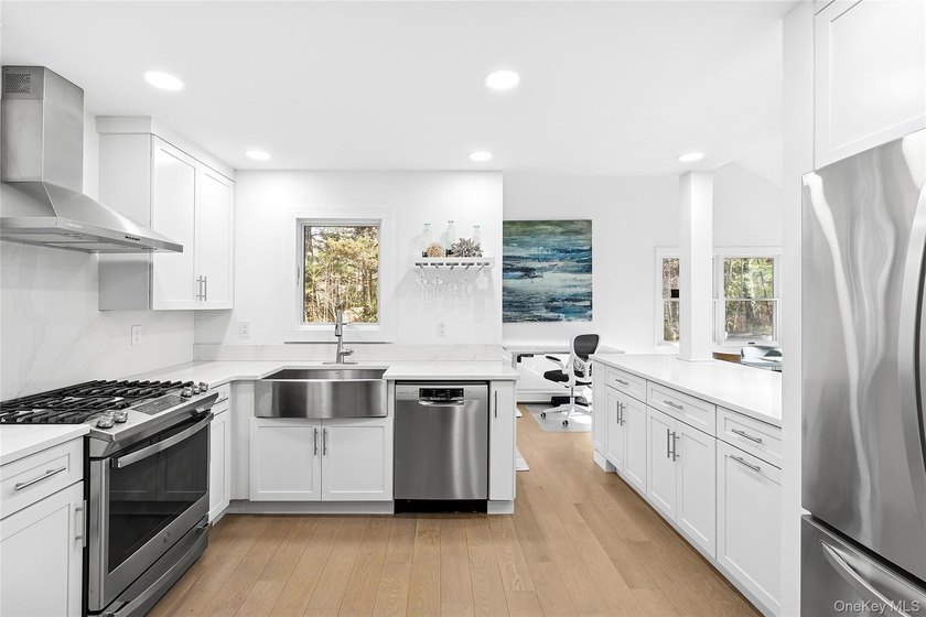 On a private, scenic, .98-acre lot in East Hampton Village - photo 5