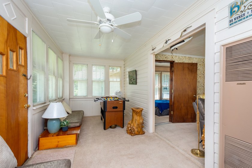 Cute as can be and full of charm! Welcome to this inviting lake - photo 8
