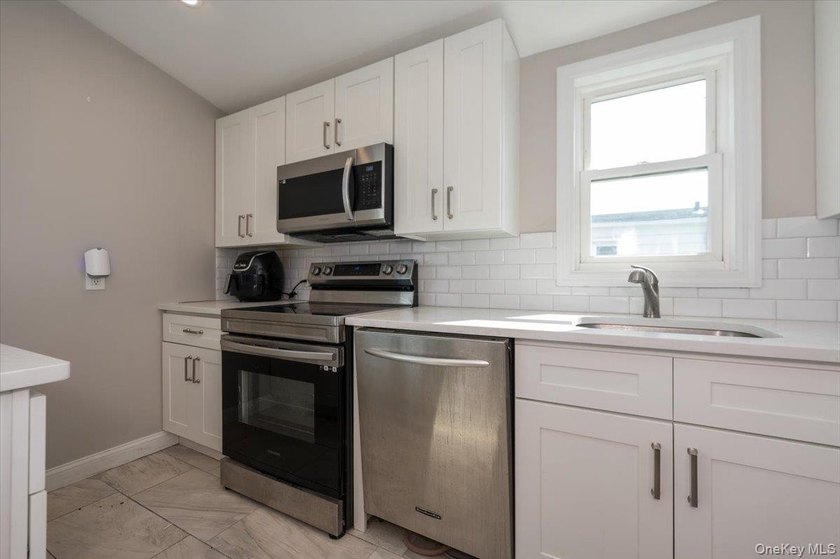 Absolutely pristine Legal two-family in Long Beach - recently - photo 19