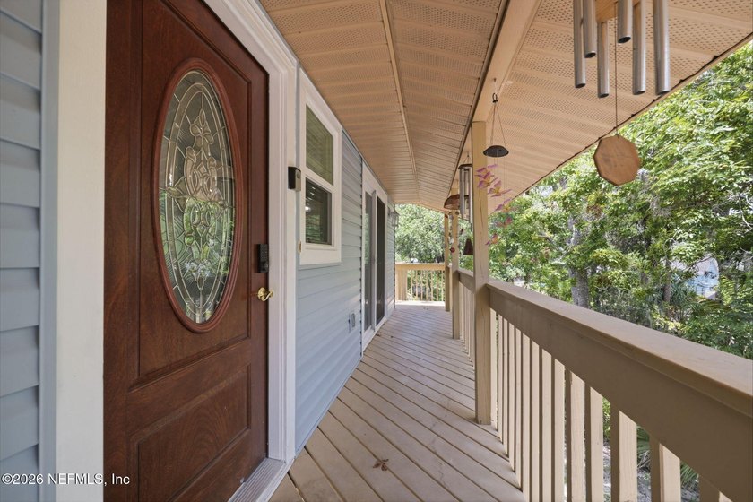 STUNNING WATERFRONT RETREAT! Welcome to your dream coastal home - photo 11