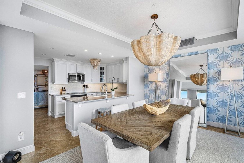 Escape to paradise in this exquisite updated penthouse unit at - photo 11