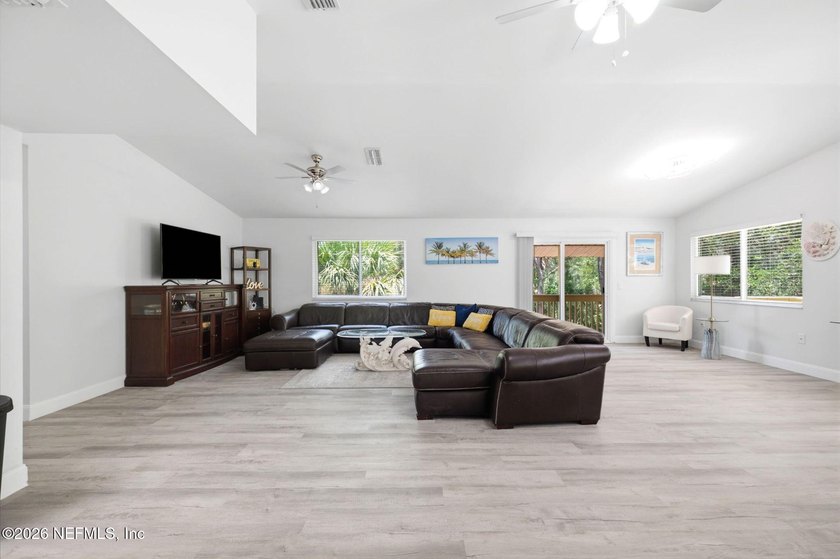 STUNNING WATERFRONT RETREAT! Welcome to your dream coastal home - photo 12