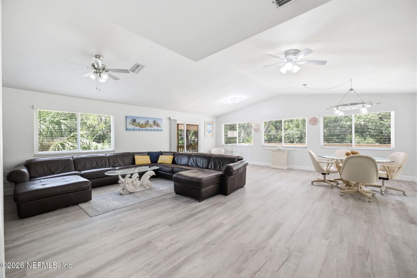 STUNNING WATERFRONT RETREAT! Welcome to your dream coastal home - photo 13