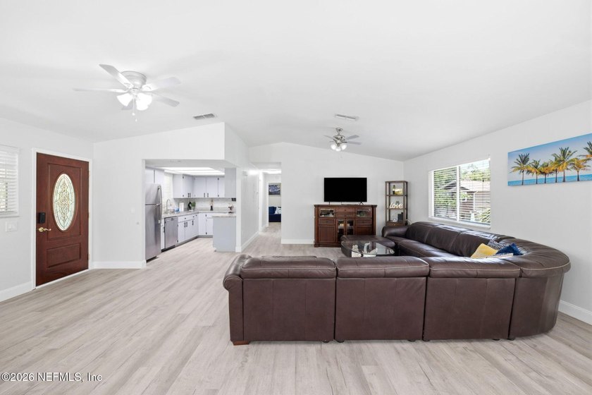 STUNNING WATERFRONT RETREAT! Welcome to your dream coastal home - photo 18