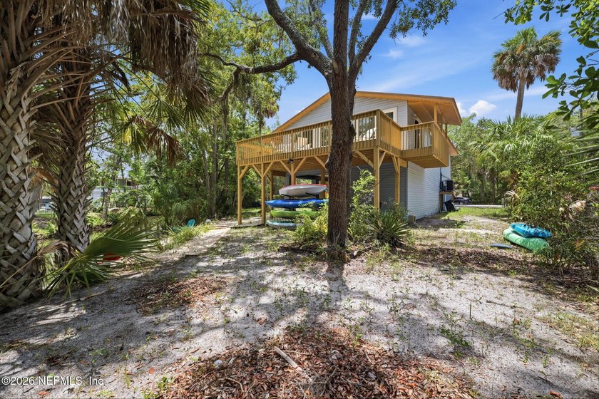 STUNNING WATERFRONT RETREAT! Welcome to your dream coastal home - photo 47
