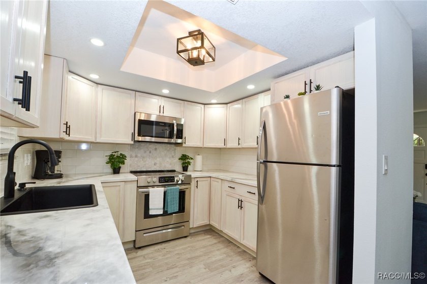 Welcome to this nicely updated 3-bedroom, 2-bath home in the - photo 6