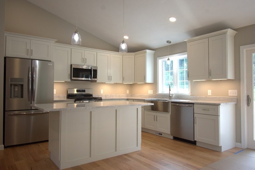 Enjoy the privacy of 1.5 acres in a country setting but offering - photo 5