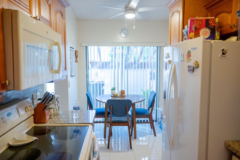 Move right into this beautifully maintained 55+ villa featuring - photo 2