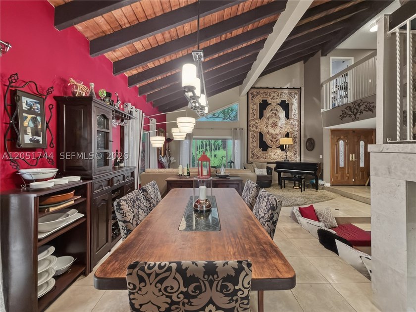 Tucked behind a private, palm-lined entrance in sought-after - photo 9