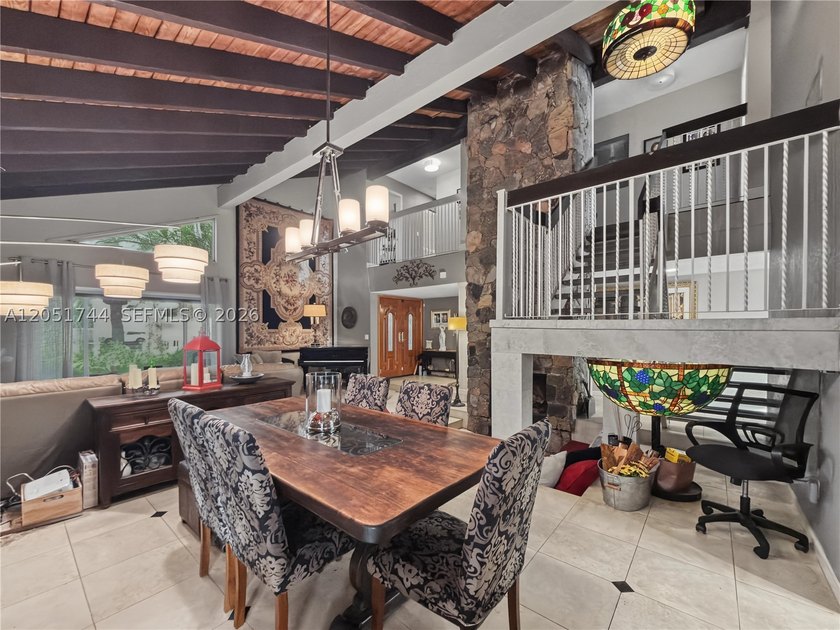 Tucked behind a private, palm-lined entrance in sought-after - photo 10