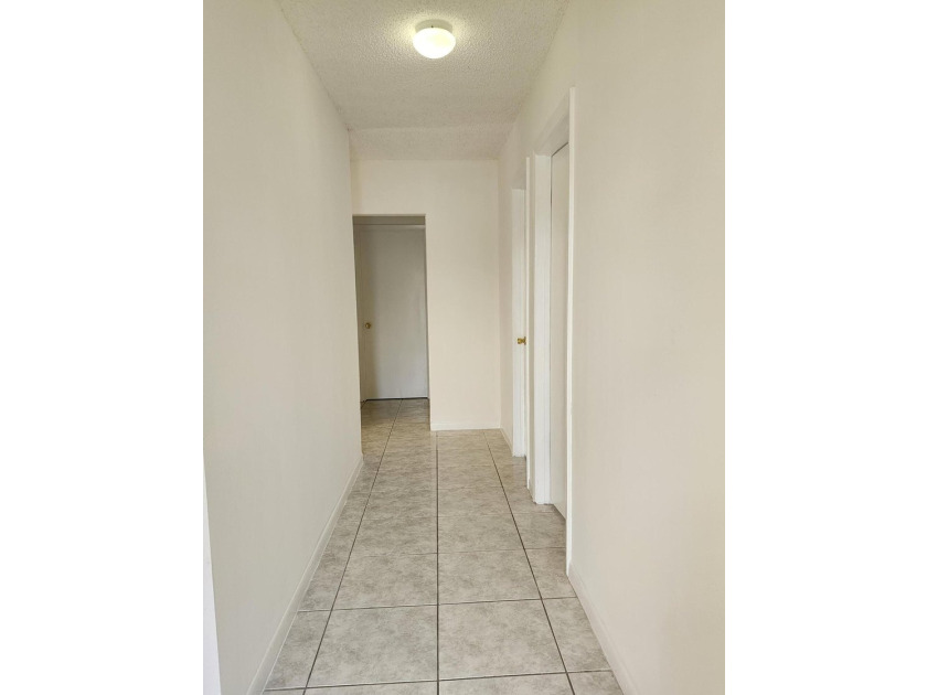 Welcome to this charming 3-bedroom, 2-bathroom townhouse located - photo 3