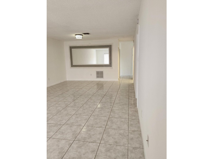 Welcome to this charming 3-bedroom, 2-bathroom townhouse located - photo 7