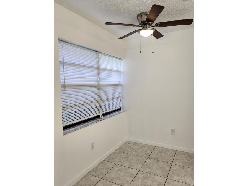 Welcome to this charming 3-bedroom, 2-bathroom townhouse located - photo 9