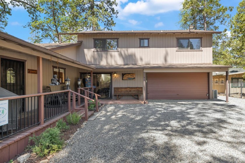 Opportunity awaits! This classic Bass Lake cabin offers the - photo 3