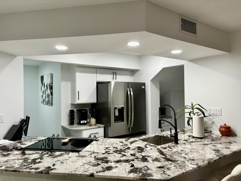 ONE LEVEL 1st floor condo is ready to move-in. Totally remodeled - photo 10