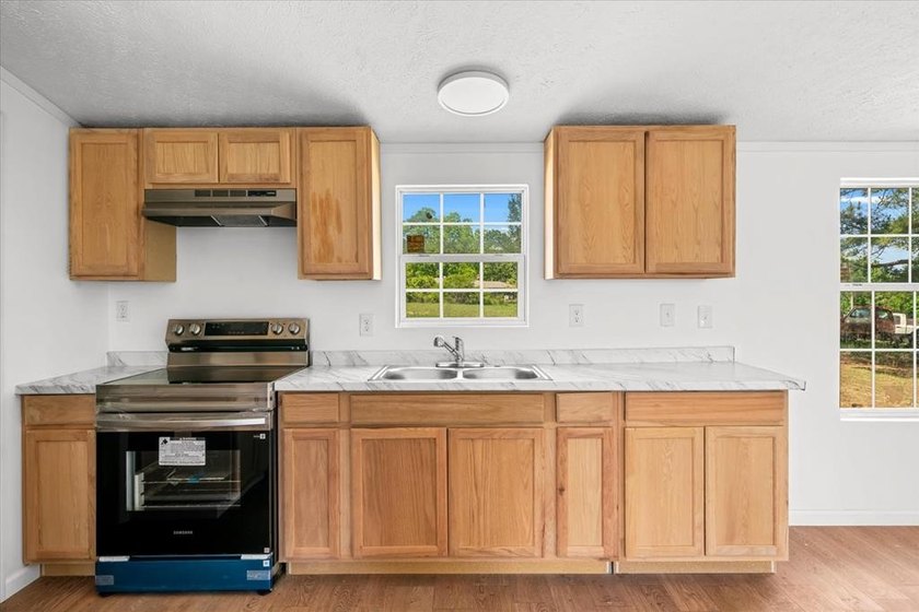 BACK ON THE MARKET AT NO FAULT TO SELLER Spacious double-wide - photo 11