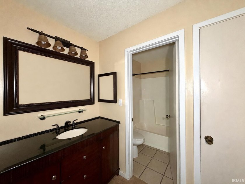 Resort Living Meets Modern Comfort! Welcome to this beautifully - photo 13