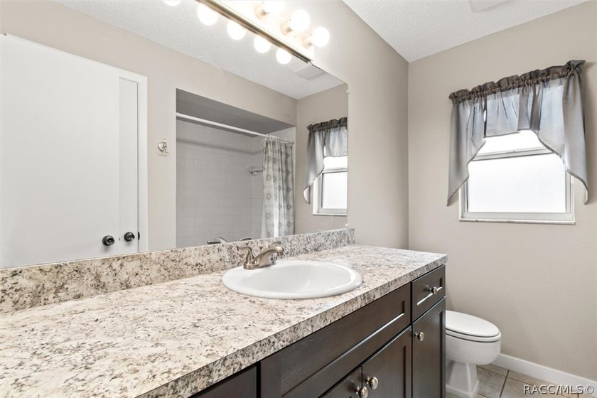 This beautifully remodeled home is right in the HEART of golf - photo 17