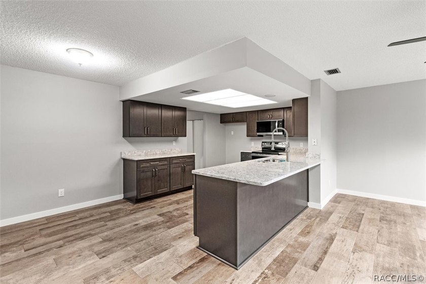 This beautifully remodeled home is right in the HEART of golf - photo 29
